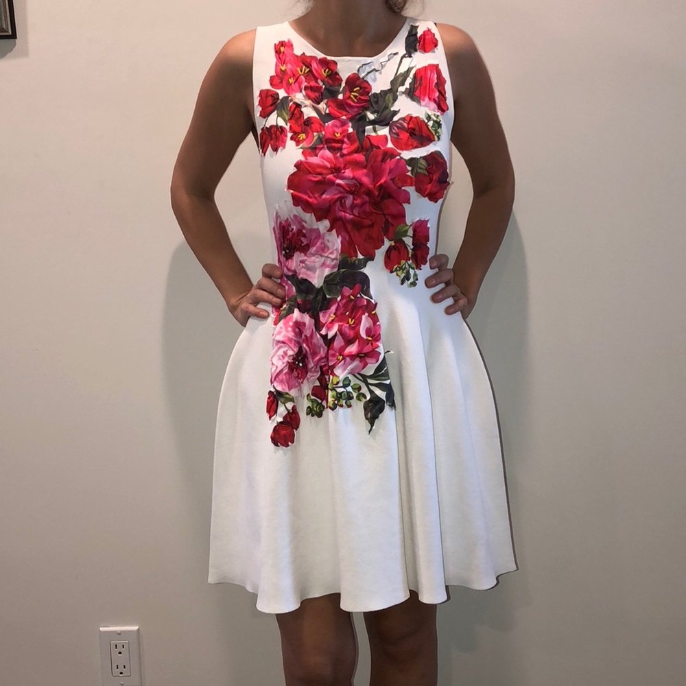 Super cute party dress with silk flower appliqué